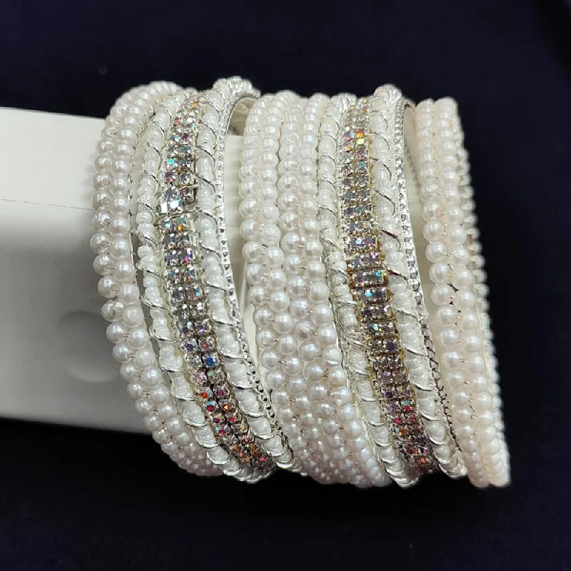 Stackable Bangles For Trendy Layered Looks-Pooja Bangles Silver Plated Austrian Stone And Pearl  Bangle Set